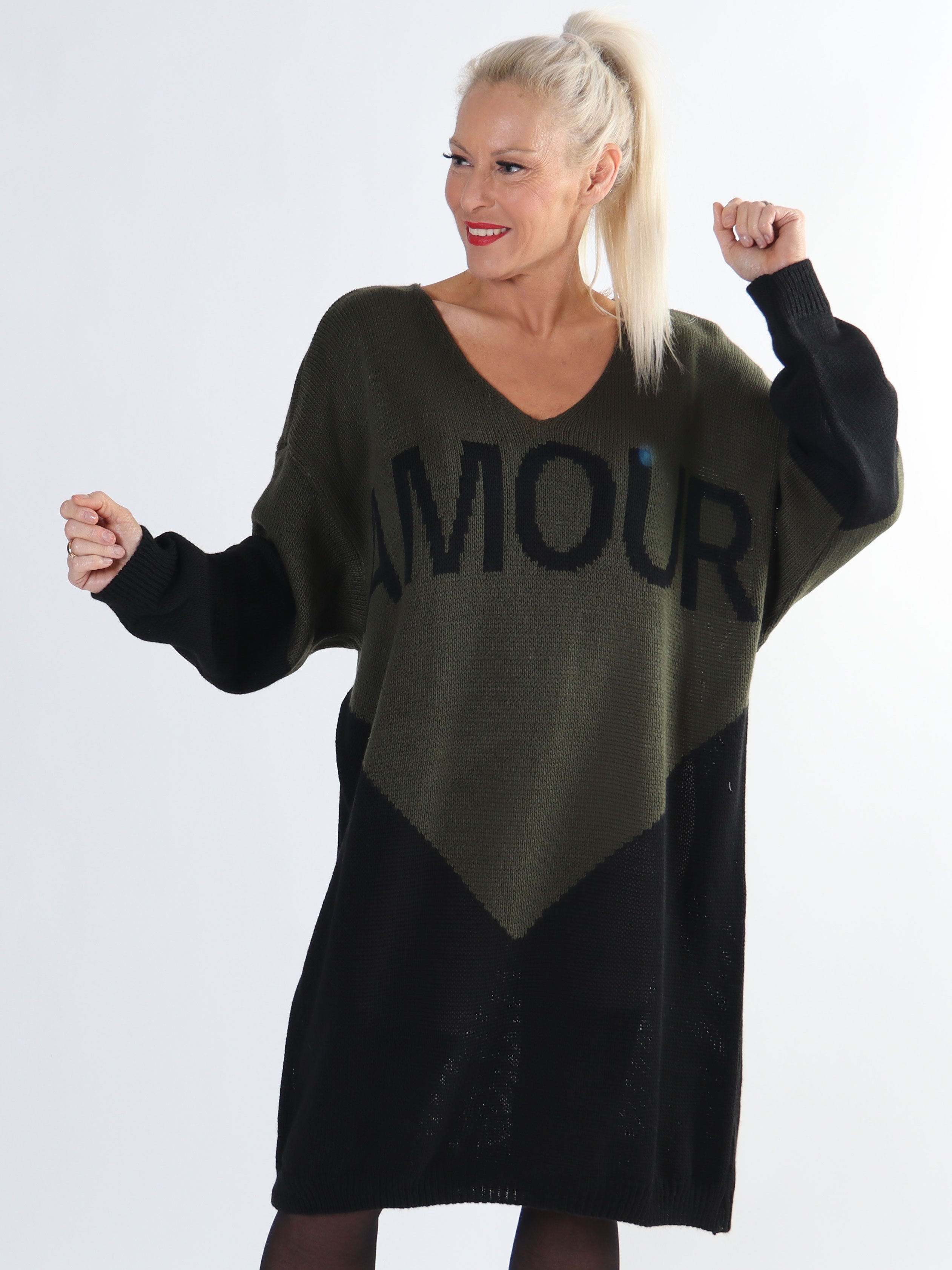 Palermo - Tvåfärgad stickad klänning i plus size med stående amour